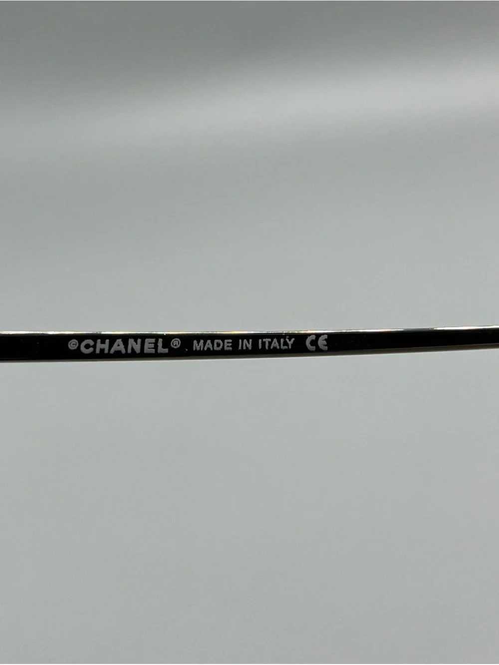 CHANEL Purple Rimless Sunglasses with Silver Bridge